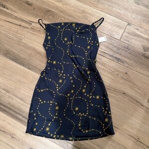 Navy blue mini dress with yellow star pattern #party #festival urban outfitters